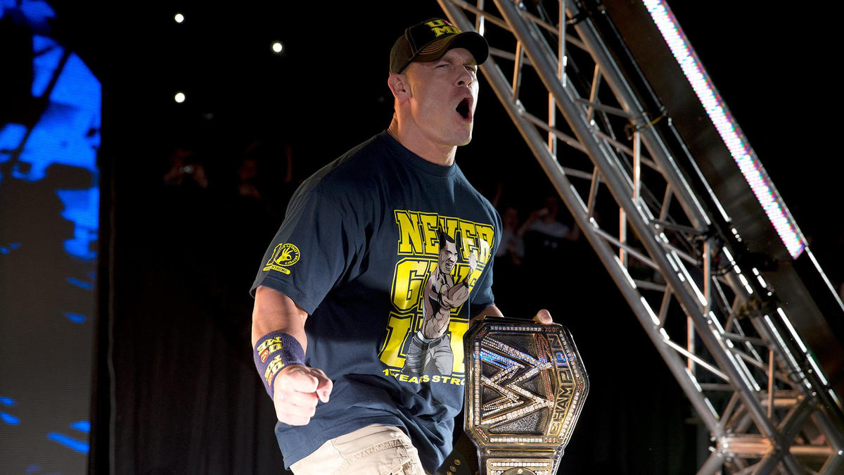 John Cena making his entrance into the arena with the WWE Championship.